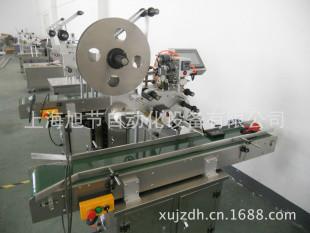 90度轉(zhuǎn)角封口不干膠貼標(biāo)機