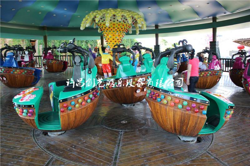 供應(yīng)情侶飛車魔幻陀螺大型游樂設(shè)備 創(chuàng)藝游樂設(shè)備 情侶飛車報價