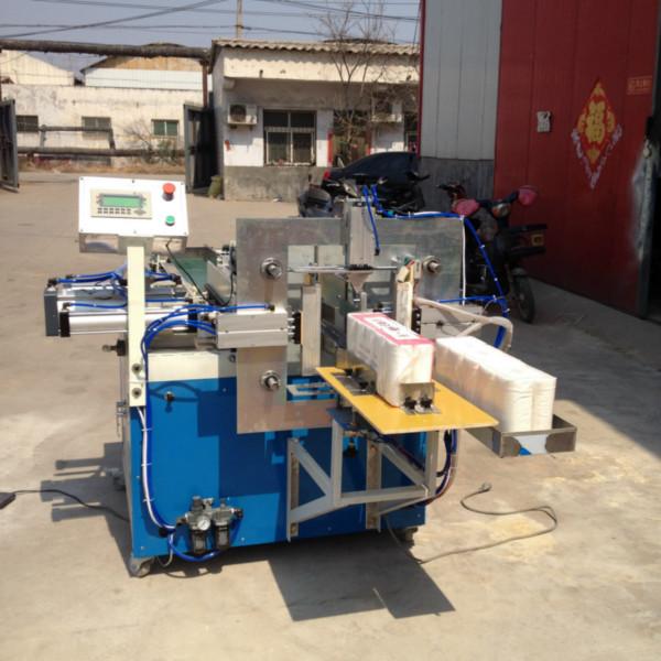 HX-30全自動(dòng)衛(wèi)生卷紙包裝機(jī)圖片
